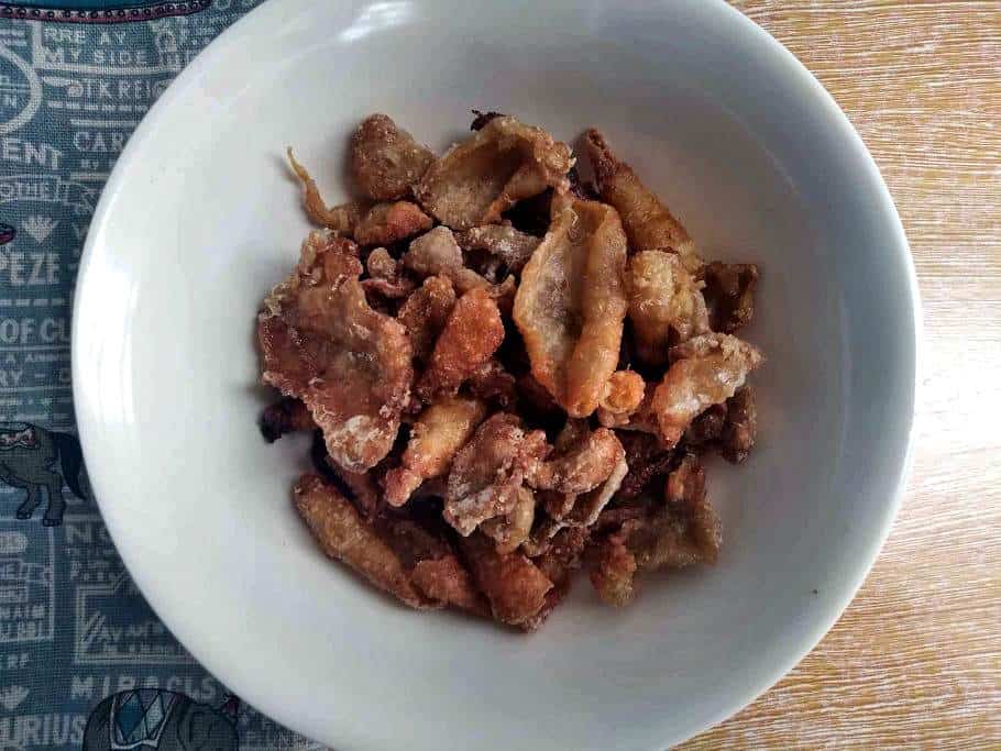 Chicken Skin Chicharon that is a deep fried serve on a plate.