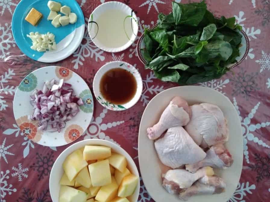Recipe ingredient of Chicken Papaya Soup (Tinolang Manok) which includes chicken drumstick & thigh, green papaya, chopped red onion, garlic, ginger, vegetable oil, fish sauce, spinach, and chicken bouillon cube.