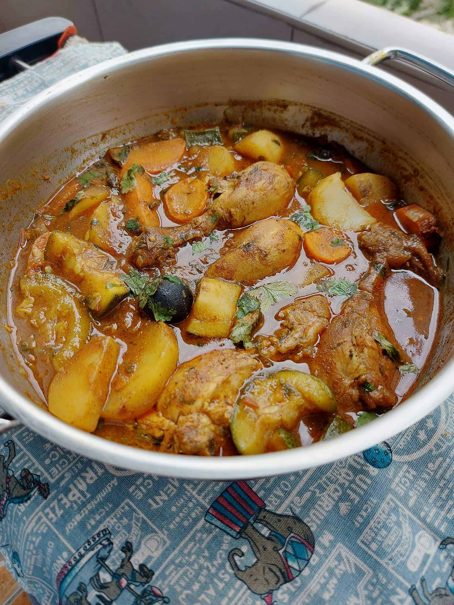 Chicken Salona recipe mixed with potatoes, carrots and zucchini cooked in tomato based stew. 
